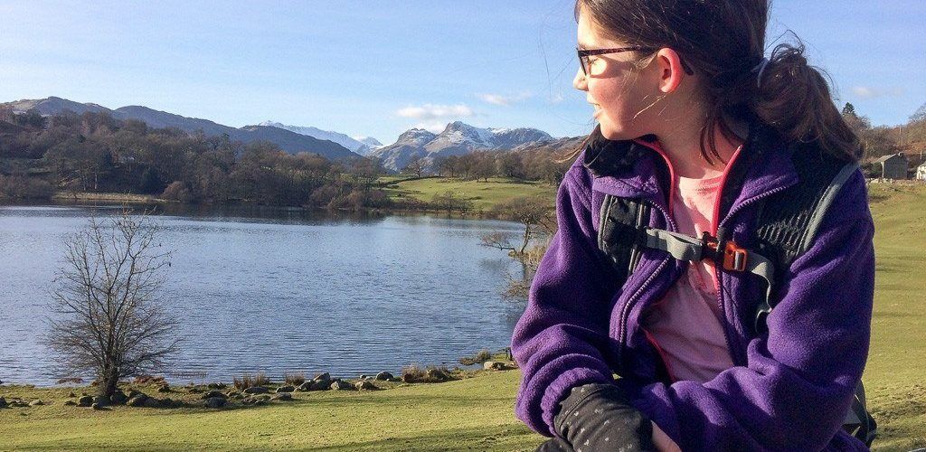 Admiring the views at Loughrigg Tarn, Cumbria